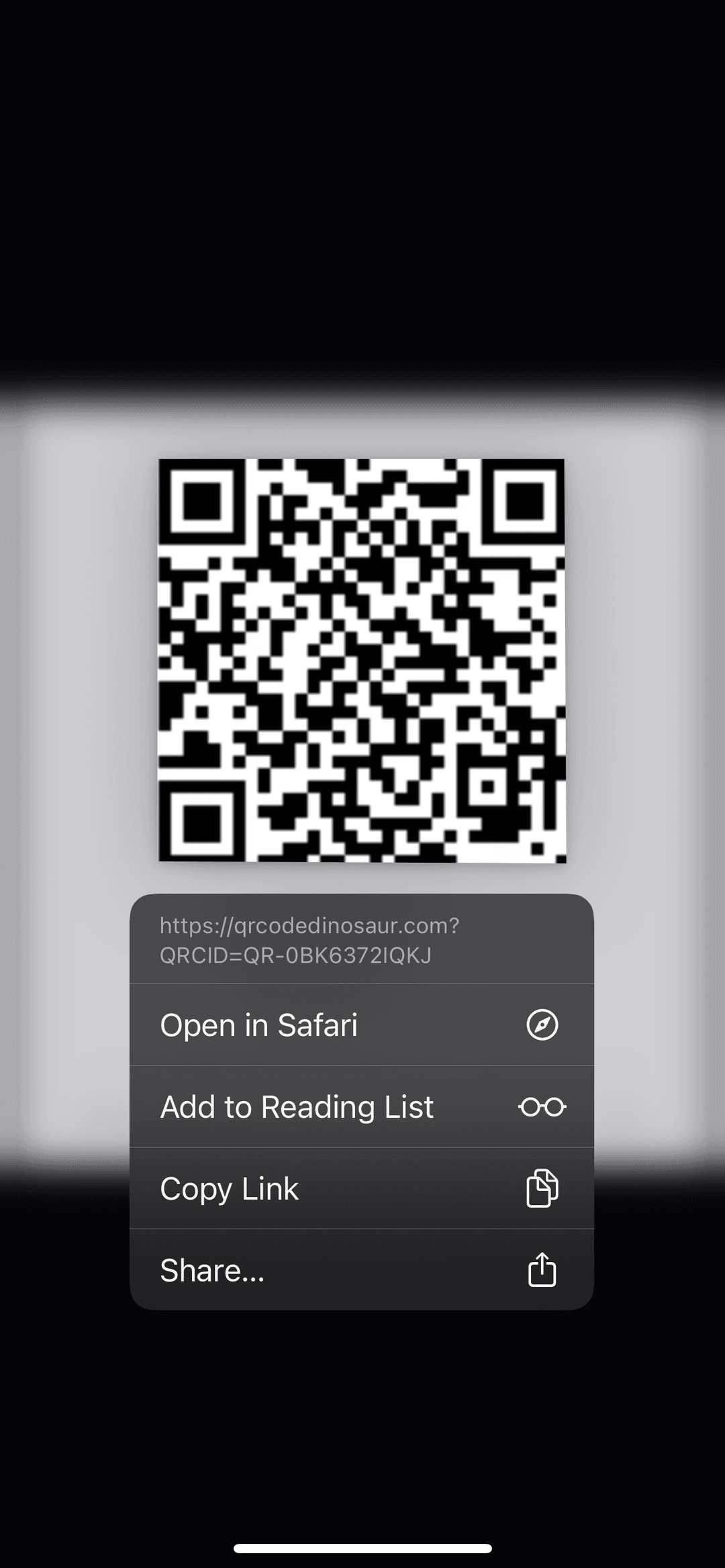iPhone QR code scanning interface showing options to open in Safari, add to reading list, copy link, or share